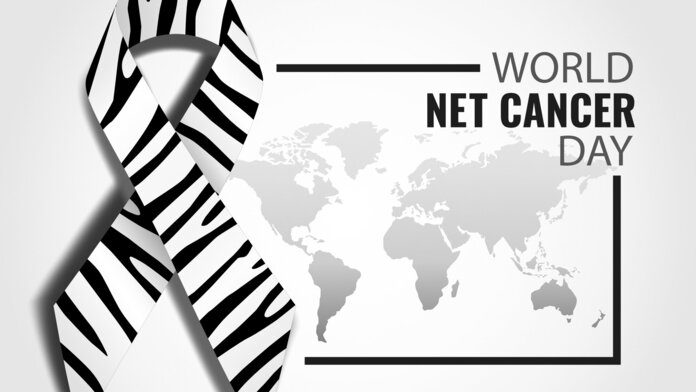 eine schwarz-weiß gestreifte Awarenessschleife vor einer angedeuteten Weltkarte; Text im Bild: World NET Cancer Day